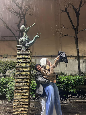 Statues of children riding fish and snail 사진 4